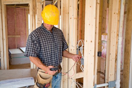 Wiring a new home by JNH Electric LLC.